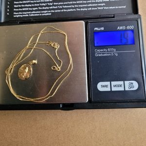 14k gold necklace and 14k pendent